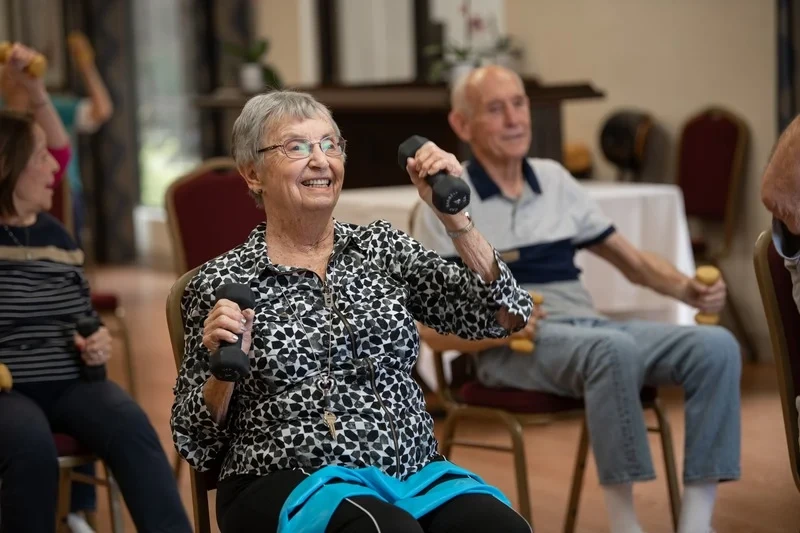 Older adults participating in low-impact exercise therapy at Pasadena Highlands to support mobility and overall health