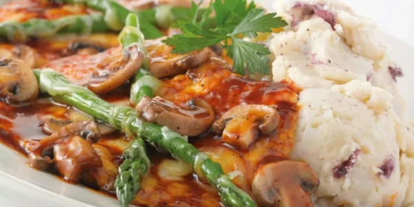 Chicken Madeira with asparagus, mushrooms and mashed potatoes at The Cheesecake Factory